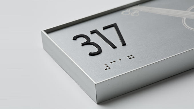 Relief and Braille signage in Gravotac™ Exterior