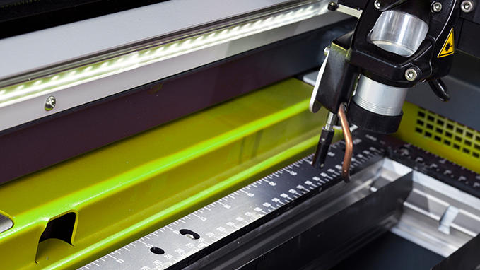 Laser machine work surface lighting