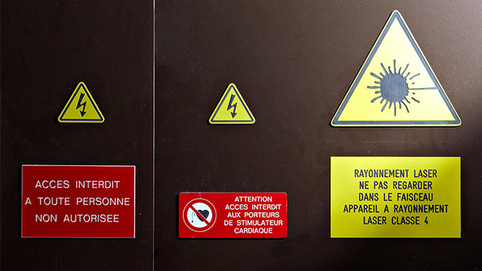 Safety signage for access to hazardous areas