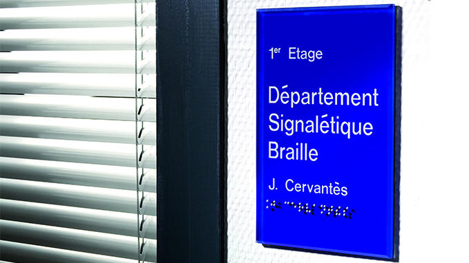 Indoor signage in Braille and relief in Gravoglas™2-Plex™Surface